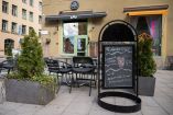 The Andon Café is pictured in Stockholm on April 27, 2026. It looks like any other coffee shop, but this Stockholm cafe is entirely run by an AI chatbot - with a human barista following orders. Andon Labs, the company behind the experiment gave a lease to Mona the AI chat bot running on Googles AI assistant Gemini, and she did the rest: hiring employees, made the menu and takes care of daily supplies, with some hiccups on the way, ordering 6000 napkins for instance.  (Photo by Jonathan NACKSTRAND / AFP)