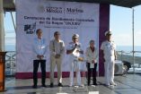Funcionarios del Gobierno de México y de la Marina durante la ceremonia de hundimiento controlado del ex buque Onjuku en Tampico, Tamaulipas.