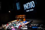 The coffin with the remains of Carlos Alberto "Indio" Solari, the iconic Argentine rock musician and former lead singer of Patricio Rey y sus Redonditos de Ricota, is pictured as fans queue to pay their respects at Villa Dominico, Buenos Aires Province, Argentina, on June 7, 2026. The singer died in Parque Leloir, Buenos Aires Province, on June 5 at the age of 77. (Photo by TOMAS CUESTA / AFP)