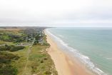 (FILES) This picture, taken on October 2, 2018 shows Omaha beach in Colleville-sur-Mer, on the French western Norman coast. Several D-Day landing beaches have been added to UNESCOs World Heritage List on July 26, 2026, the culmination of a project launched nearly 20 years ago that could boost tourism. (Photo by DAMIEN MEYER / AFP)