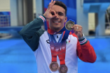 Juan Celaya con sus medallas en Centroamericanos
