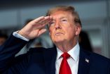 President Donald Trump during the National Anthem at the start of the Freedom 250 Grand Prix Race on the streets of Washington, DC,  Sunday, Aug. 23, 2026. Doug Mills/Pool via REUTERS