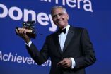 US actor and filmmaker George Clooney receives the Golden Lion for Lifetime Achievement during the opening ceremony of the 83rd International Venice Film Festival, on September 2, 2026 at Venice Lido. (Photo by Tiziana FABI / AFP)