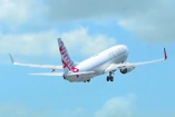 Dos pasajeros fueron esposados en un vuelo Melbourne–Doha tras proferir amenazas contra tripulación y pasajeros.