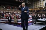 US President Donald Trump dances during a campaign rally in Vandalia, Ohio, on October 3, 2026. (Photo by Brendan SMIALOWSKI / AFP)