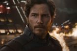 Chris Pratt como Star-Lord, con traje oscuro y expresión seria, frente a un incendio en Guardianes de la Galaxia Vol. 3.