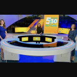 Las conductoras Marlene Stahl, Brisseida Moya y Nuria Gil en el set de Imagen Noticias 5:30, de pie frente a la mesa principal del noticiero con la imagen del programa al fondo, durante su estreno en Imagen Televisión.