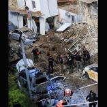 Servicios de emergencia de Israel trabajan en zona de impacto de misil iraní.