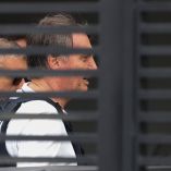 Former Brazilian President Jair Bolsonaro arrives home to begin serving house arrest following authorization by Supreme Court Justice Alexandre de Moraes, after Bolsonaro was convicted by a Supreme Court majority of plotting a coup to remain in power after losing the 2022 election, in Brasilia, Brazil March 27, 2026. REUTERS/Adriano Machado