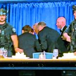 U.S. President Donald Trump is escorted out as a shooter opens fire during the annual White House Correspondents' Association dinner in Washington, D.C., U.S., April 25, 2026, in this screen capture from video. REUTERS/Bo Erickson THIS IMAGE WAS PROCESSED BY REUTERS TO ENHANCE QUALITY, AN UNPROCESSED VERSION HAS BEEN PROVIDED SEPARATELY.     TPX IMAGES OF THE DAY