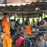 A handout picture taken and released on May 8, 2026 by Indonesia's National Search and Rescue Agency (BASARNAS) shows rescue workers waiting in a shelter after the volcanic eruption of Mount Dukono in North Halmahera, North Maluku. Three hikers died in an eruption on May 8 of Indonesia's Mount Dukono volcano where they found themselves in a no-go zone, officials said. (Photo by Handout / National Search and Rescue Agency (BASARNAS) / AFP) / -----EDITORS NOTE --- RESTRICTED TO EDITORIAL USE - MANDATORY CREDIT "AFP PHOTO / Indonesia's National Search and Rescue Agency (BASARNAS) " - NO MARKETING - NO ADVERTISING CAMPAIGNS - DISTRIBUTED AS A SERVICE TO CLIENTS