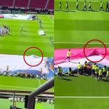 Voluntario en Guadalajara queda envuelto en la bandera de Chequia.