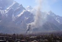 Smoke billows after Shiite Muslim protesters set fire to a United Nations office during an anti-US and Israel protest in Skardu in Pakistan's Gilgit-Baltistan region on March 1, 2026. Pro-Iranian protesters angered by the death of Iran's supreme leader Ali Khamenei tried to storm the US consulate in Pakistan's Karachi on March 1, leaving eight dead. Thousands of people were also taking to the streets in the eastern city of Lahore and in northern Skardu, with a demonstration expected in the afternoon near the diplomatic enclave housing the US embassy in the capital Islamabad. (Photo by Manzoor BALTI / AFP)