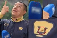Efraín Juárez limpia popó de pájaro con el escudo de Pumas durante entrevista.