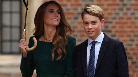 Britain's Catherine, Princess of Wales (L) walks with her 13-year-old son, Britain's Prince George of Wales (R), as he arrives for his first day at Eton College, in Eton, west of London, on September 8, 2026. (Photo by Adrian DENNIS / POOL / AFP)