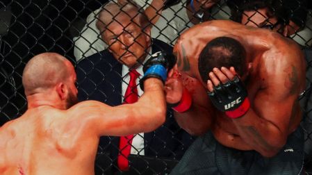 U.S. President Donald Trump watches a match during the UFC 327 event at Kaseya Center in Miami, Florida, U.S., April 11, 2026.  REUTERS/Kevin Lamarque     TPX IMAGES OF THE DAY