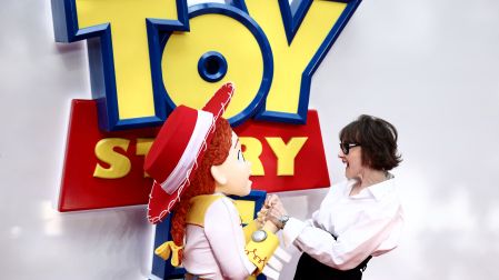US actor Joan Cusack poses with her character Jessie upon arrival to attend the red carpet for the UK launch event of the film 'Toy Story 5' in London on May 28, 2026. Henry NICHOLLS / AFP