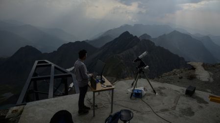 Astrologists from the University of Toulouse prepare equipment ahead of observing a partial solar eclipse on the summit of the Pic du Midi on August 12, 2026. In France the solar eclipse will not be full - after the total solar eclipse of 1999 France will not see another total eclipse for another 55 years, in 2081. (Photo by Ed JONES / AFP)