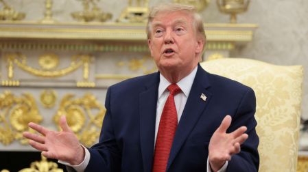 U.S. President Donald Trump speaks as he hosts 16-year-old lifeguard Ryder Williams, who saved a child off the coast of Santa Cruz, California, last month, Nathaniel Rai, the child saved by Williams, and Nathaniel's family members in the Oval Office at the White House in Washington, D.C., U.S., August 17, 2026. REUTERS/Kylie Cooper
