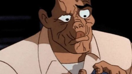 Clayface como Matt Hagen en Batman La serie animada, con el rostro deformado, cabello negro y camisa blanca.