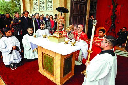 Latin Patriarch of Jerusalem, Cardinal Pierbattista Pizzaballa, censes during a prayer service to mark Palm Sunday in Jerusalem on March 29, 2026, following the cancellation of the traditional Palm Sunday procession from the Mount of Olives amid restrictions on gathering in large groups and the US-Israeli war on Iran. Israeli authorities have cancelled the Palm Sunday procession in Jerusalem due to wartime restrictions. Israel has been at war since it and the US launched strikes against Iran on February 28, sparking swift retaliation by the Islamic republic which responded with missile attacks across the region. (Photo by Ammar Awad / POOL / AFP)