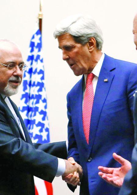 El ministro de Exteriores, Mohammad Javad Zarif, y el secretario de Estado, John Kerry, en 2013.