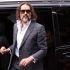 British comedian and actor Russell Brand arrives for the start of his trial at Southwark Crown Court in south London on October 12, 2026, after pleading not guilty to three charges of rape, indecent assault, and three counts of sexual assault. (Photo by Brook Mitchell / AFP)