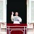 Pope Leo XIV addresses the crowd from the window of the apostolic palace overlooking St. Peter's square during the Angelus prayer in The Vatican on January 18, 2026. (Photo by Tiziana FABI / AFP)