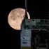 The Moon sets behind NASA’s Artemis II SLS (Space Launch System) rocket and Orion spacecraft atop a mobile launcher at Launch Complex 39B at NASA’s Kennedy Space Center in Florida during the Artemis II wet dress rehearsal on Sunday, Feb. 1, 2026.