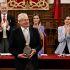 Mexican writer Gonzalo Celorio holds the Miguel de Cervantes Prize of Hispanic Literature after receiving it from the hands of King Felipe VI of Spain (L) and his wife Queen Letizia (2R) during a ceremony at the University of Alcala de Henares in Alcala de Henares on April 23, 2026. (Photo by Andres BALLESTEROS / POOL / AFP)