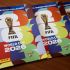 The picture shows albums of collectible cards featuring football players for the upcoming 2026 FIFA World Cup hosted by the US, Canada and Mexico, at the Panini Group factory in Modena, northern Italy, on April 28, 2026. The Panini Group holds the exclusive rights for the official collectible cards and stickers for the 2026 FIFA World Cup hosted by the US, Canada, and Mexico. (Photo by MARCO BERTORELLO / AFP)