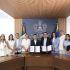 Pablo Lemus y funcionarios de Jalisco muestran documentos firmados en acto oficial sobre transporte gratuito y salud infantil en edificio gubernamental.
