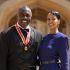British actor Idris Elba poses with his wife Sabrina Dhowre Elba and his medal after being appointed as a Knight Bachelor (Knighthood) for services to young people at an investiture ceremony at Windsor Castle on June 2, 2026. (Photo by Andrew Matthews / POOL / AFP)