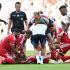 Soccer Football - Pre Season Friendly - Bayern Munich v RB Leipzig - Allianz Arena, Munich, Germany - August 15, 2026 Bayern Munich's Jamal Musiala receives medical attention after sustaining an injury as Ismael Saibari looks on REUTERS/Angelika Warmuth
