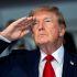 President Donald Trump during the National Anthem at the start of the Freedom 250 Grand Prix Race on the streets of Washington, DC,  Sunday, Aug. 23, 2026. Doug Mills/Pool via REUTERS