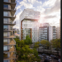 ICON Hamburgo muestra una fachada residencial contemporánea en Ciudad de México, rodeada de edificios, árboles y vialidades urbanas.