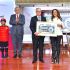 Homenaje a la fuerza laboral y planes de modernización.