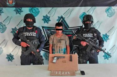 Detienen a presunto implicado en ejecución de policías en Zihuatanejo 