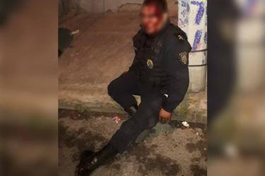 Golpean y roban arma de cargo a ‘poli’ en carnaval de Peñón de los Baños 