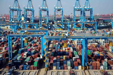 Celebra China con mesura pacto preliminar con EU