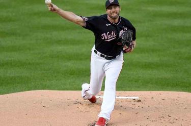 Max Scherzer dejó en blanco a Rays durante siete entradas. (AFP)