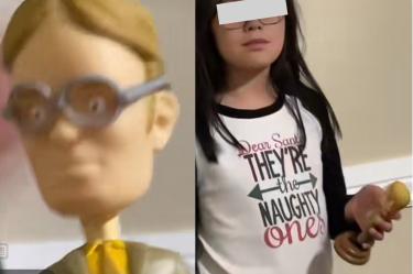 Niña con muñeco 'cabeza de globo' de Dwight Schrute de The Office