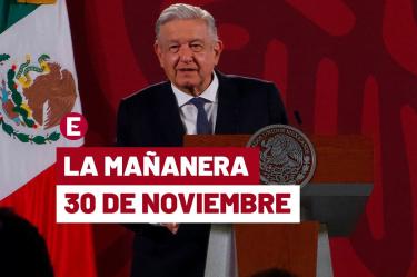 AMLO de traje oscuro en una de sus conferencias