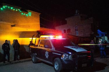 Escena de un homicidio y una patrulla