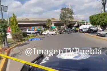 Cuerpo de hombre sobre calle de Cholula Puebla