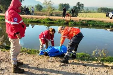 Encuentra a persona desaparecida en canal de agua.