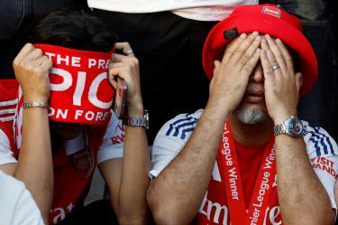 Aficionados del Arsenal lamentan que el equipo perdió la final de la Champions League