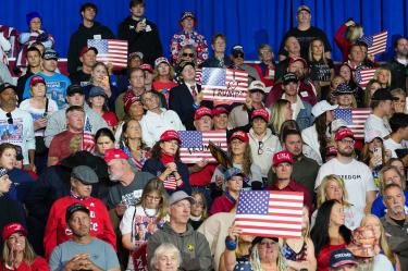 HIGHLAND HEIGHTS, KENTUCKY - OCTOBER 17: Attendees look on as U.S. President Donald Trump speaks during a midterm rally at Truist Arena on the Northern Kentucky University campus on October 17, 2026 in Highland Heights, Kentucky. President Trump traveled to Kentucky to headline the rally for Republican candidates ahead of the midterm elections. Eric Lee/Getty Images/AFP (Photo by Eric Lee / GETTY IMAGES NORTH AMERICA / Getty Images via AFP)
