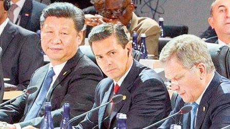 Los presidentes de China, Xi Jinping; de México, Enrique Peña Nieto, y de Finlandia, Sauli Niinistö, durante la Cuarta Cumbre de Seguridad Nuclear en Washington, en Estados Unidos. Foto: Especial 