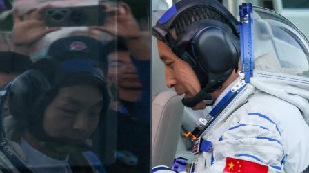 Astronaut Zhang Zhiyuan is reflected on a glass as astronaut Zhu Yangzhu enters a vehicle, on the day of a see-off ceremony before taking part in the Shenzhou-23Â spaceflight mission toÂ China's TiangongÂ spaceÂ station, atÂ JiuquanÂ SatelliteÂ LaunchÂ Center, nearÂ Jiuquan, Gansu province,Â China, May 24, 2026. REUTERS/Maxim Shemetov